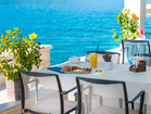Boutique hotel by the sea - the covered outdoor terrace offers perfect protection from the heat